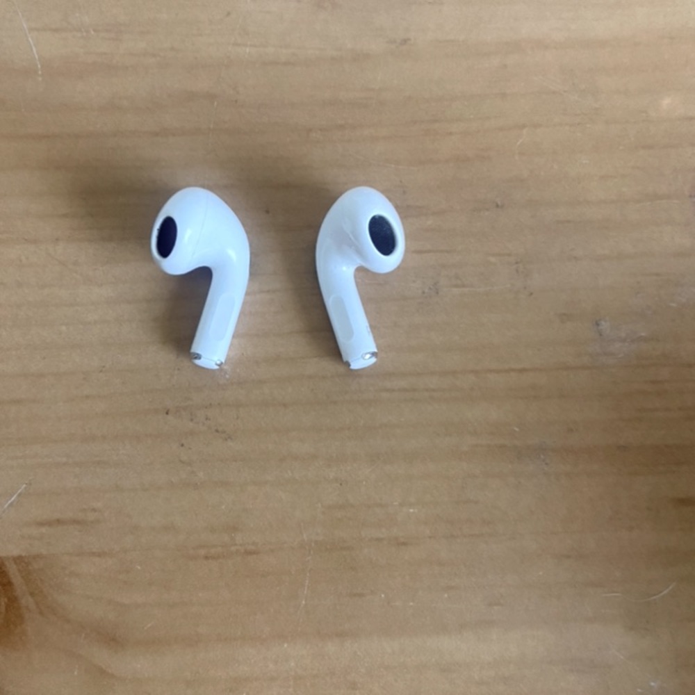 Apple AirPods. Left ear and right ear. No charging  case